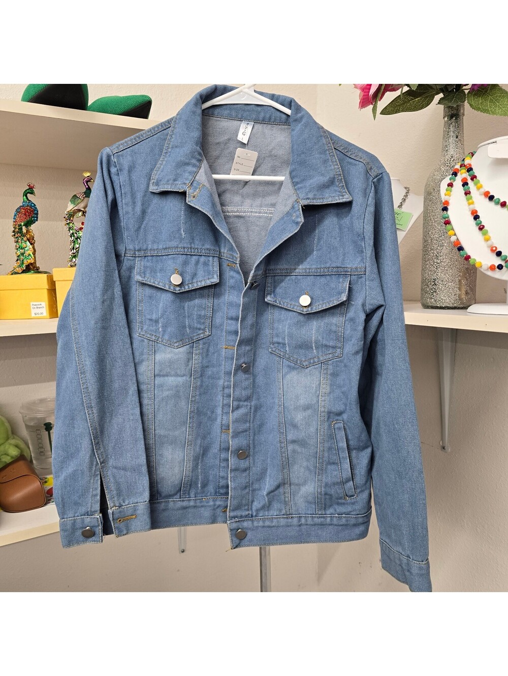 Women’s size Large light-wash denim jacket